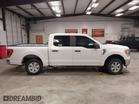 2021 Ford F-150 XL with VIN 1FTEW1C57MFA71572, listed as a IAAI auction lot 41549588 with 82,389 mi miles and . Bid and sale history available at carsss.com. Image 14.
