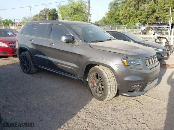 2015 Jeep Grand Cherokee SRT with VIN 1C4RJFDJ9FC842448, listed as a IAAI auction lot 41850385 with 178,439 mi miles. Bid and sale history available at carsss.com. Image 1.