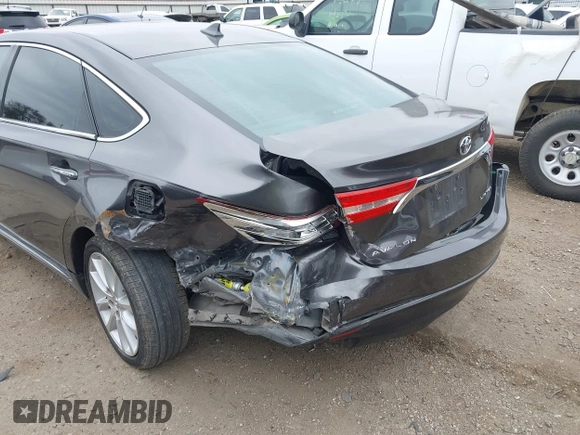 2015 Toyota Avalon Limited with VIN 4T1BK1EB4FU167011, listed as a IAAI auction lot 41582722 with 77,314 mi miles and . Bid and sale history available at DreamBid. Image 6.