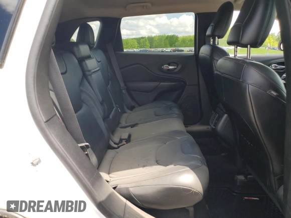 2014 Jeep Cherokee Trailhawk z VIN 1C4PJMBS5EW201897, wystawiony jako Copart lot #57378795 z przebiegiem 172 715 mil mil oraz Szkoda całkowita • Salvage title. Historia ofert i sprzedaży dostępna na DreamBid. Obrazek 11.