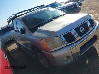 2004 Nissan Titan SE with VIN 1N6AA06A84N532698, listed as a IAAI auction lot 41736557 with 149,743 mi miles. Bid and sale history available at carsss.com. Image 1.