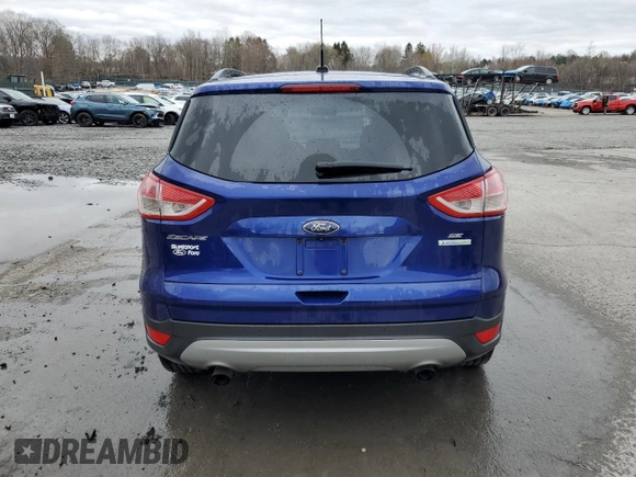 2015 Ford Escape SE with VIN 1FMCU0GX5FUC58323, listed as a Copart auction lot 53029045 with 67,300 mi miles and Salvage Title. Bid and sale history available at carsss.com. Image 6.