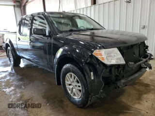 2018 Nissan Frontier SV with VIN 1N6AD0FVXJN702033, listed as a Copart auction lot 63436595 with 64,231 mi miles and Salvage title. Bid and sale history available at DreamBid. Image 4.