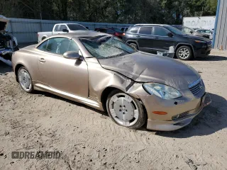 2002 Lexus SC 430 with VIN JTHFN48Y220006106, listed as a Copart auction lot 76703744 with 114,122 mi miles and Salvage Title. Bid and sale history available at DreamBid. Image 4.