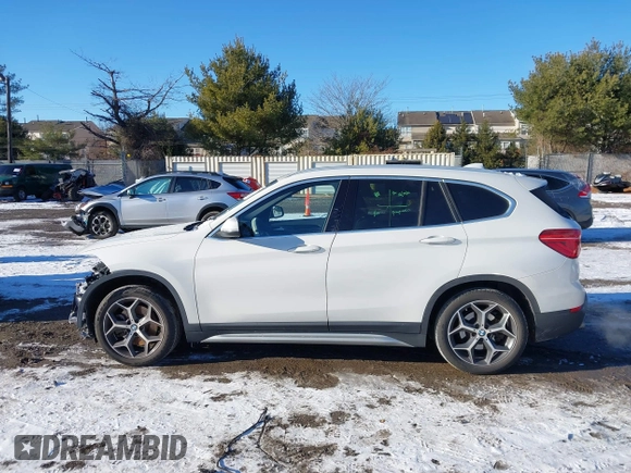 2018 BMW X1 xDrive28i z VIN WBXHT3C36J5L30217, wystawiony jako IAAI lot #41237775 z przebiegiem 60 071 mil mil oraz . Historia ofert i sprzedaży dostępna na DreamBid. Obrazek 14.