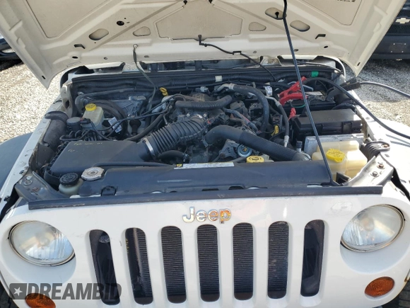 2008 Jeep Wrangler X with VIN 1J4FZ24128L612526, listed as a Copart auction lot 49152275 with 128,584 mi miles and Clean title. Bid and sale history available at DreamBid. Image 11.