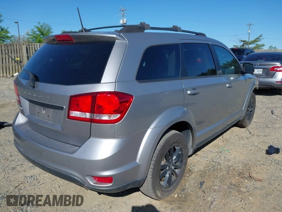 2019 Dodge Journey SE with VIN 3C4PDCBB7KT872524, listed as a IAAI auction lot 42093711 with 86,519 mi miles and . Bid and sale history available at DreamBid. Image 4.