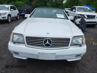 1991 Mercedes-Benz 500 z VIN WDBFA66E9MF020617, wystawiony jako IAAI lot #42355637 z przebiegiem 93 104 mil mil oraz . Historia ofert i sprzedaży dostępna na DreamBid. Obrazek 12.