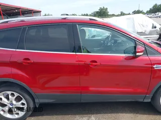 2013 Ford Escape Titanium with VIN 1FMCU0J98DUC93235, listed as a IAAI auction lot 42253289 with 107,030 mi miles and . Bid and sale history available at DreamBid. Image 13.
