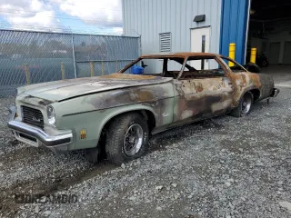 1975 Oldsmobile Cutlass z VIN 3J57K5M184289, wystawiony jako Copart lot #75477924 z przebiegiem Nie podano mil oraz Nie do naprawy. Historia ofert i sprzedaży dostępna na DreamBid. Obrazek 1.