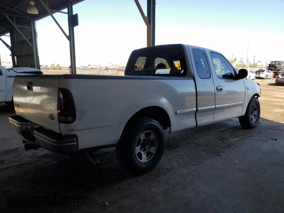1998 Ford F-150 with VIN 1FTDX176XWNA06879, listed as a Copart auction lot 46032145 with 211,308 mi miles and Salvage title. Bid and sale history available at DreamBid. Image 3.