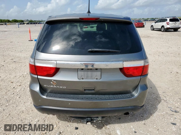 2013 Dodge Durango SXT with VIN 1C4RDHAGXDC592730, listed as a Copart auction lot 60841945 with 130,239 mi miles and Salvage title. Bid and sale history available at DreamBid. Image 6.