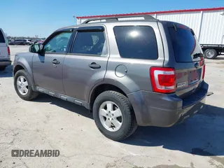 2011 Ford Escape XLT with VIN 1FMCU0D74BKA81385, listed as a IAAI auction lot 41895835 with 238,298 mi miles. Bid and sale history available at carsss.com. Image 3.