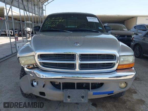 2002 Dodge Dakota SLT with VIN 1B7HG48N62S546119, listed as a IAAI auction lot 41826998 with 157,761 mi miles. Bid and sale history available at carsss.com. Image 12.
