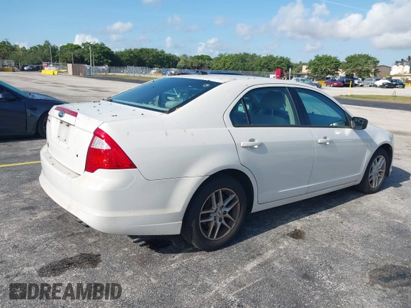 2012 Ford Fusion S with VIN 3FAHP0GA5CR121825, listed as a IAAI auction lot 42203716 with 138,717 mi miles and . Bid and sale history available at carsss.com. Image 4.