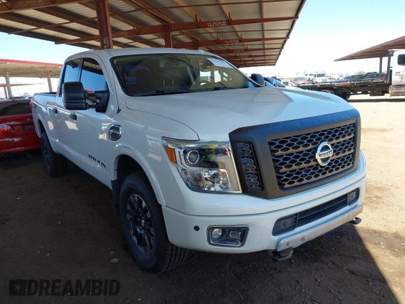 2019 Nissan Titan Pro-4X with VIN 1N6BA1F45KN533051, listed as a IAAI auction lot 42587343 with 134,768 mi miles and . Bid and sale history available at DreamBid. Image 1.