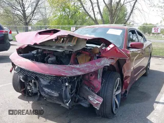 2019 Dodge Charger R/T z VIN 2C3CDXCTXKH573104, wystawiony jako IAAI lot #42126922 z przebiegiem 93 953 mil mil oraz . Historia ofert i sprzedaży dostępna na DreamBid. Obrazek 6.