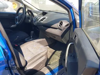 2011 Ford Fiesta SE with VIN 3FADP4BJ6BM145768, listed as a IAAI auction lot 42192387 with 159,825 mi miles and . Bid and sale history available at carsss.com. Image 5.