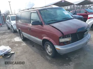 1999 Chevrolet Astro with VIN 1GNEL19W5XB102247, listed as a IAAI auction lot 41598483 with 184,041 mi miles. Bid and sale history available at carsss.com. Image 1.