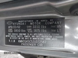 2002 Hyundai Accent GL z VIN KMHCG45C52U372587, wystawiony jako IAAI lot #42244428 z przebiegiem 43 538 mil mil oraz . Historia ofert i sprzedaży dostępna na DreamBid. Obrazek 9.
