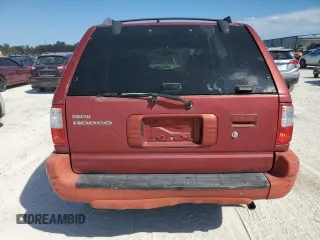 2001 Isuzu Rodeo S z VIN 4S2CK58W414317422, wystawiony jako Copart lot #75123154 z przebiegiem Nie podano mil oraz Szkody całkowita. Historia ofert i sprzedaży dostępna na DreamBid. Obrazek 6.