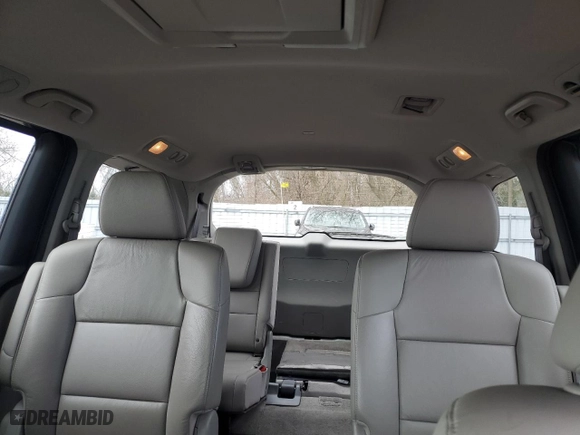 2012 Honda Odyssey EX-L with VIN 5FNRL5H61CB508181, listed as a Copart auction lot 52174205 with 203,763 mi miles and Salvage Title. Bid and sale history available at carsss.com. Image 10.