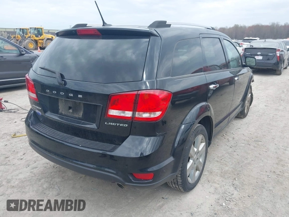 2014 Dodge Journey Limited with VIN 3C4PDDDG6ET118355, listed as a IAAI auction lot 42030856 with 164,740 mi miles and . Bid and sale history available at carsss.com. Image 4.