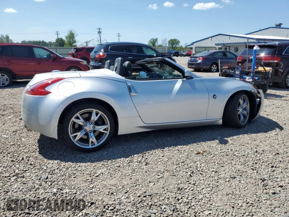 2012 Nissan 370Z Touring with VIN JN1AZ4FH3CM370910, listed as a Copart auction lot 65940005 with 23,009 mi miles and Salvage title. Bid and sale history available at DreamBid. Image 3.