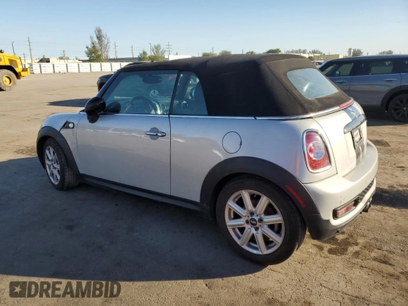 2013 MINI Convertible S with VIN WMWZP3C50DT550800, listed as a Copart auction lot 42409015 with 101,421 mi miles and Salvage title. Bid and sale history available at DreamBid. Image 2.