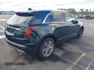 2024 Cadillac XT5 FWD Premium Luxury with VIN 1GYKNCR45RZ733939, listed as a IAAI auction lot 41224515 with 6,945 mi miles. Bid and sale history available at carsss.com. Image 4.