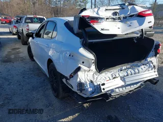 2023 Toyota Camry SE with VIN 4T1T11AKXPU167223, listed as a IAAI auction lot 41667076 with 31,658 mi miles and . Bid and sale history available at DreamBid. Image 3.