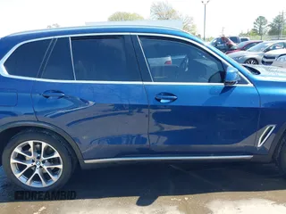 2021 BMW X5 sDrive40i with VIN 5UXCR4C03M9F14479, listed as a IAAI auction lot 41884878 with 1 mi miles. Bid and sale history available at carsss.com. Image 13.