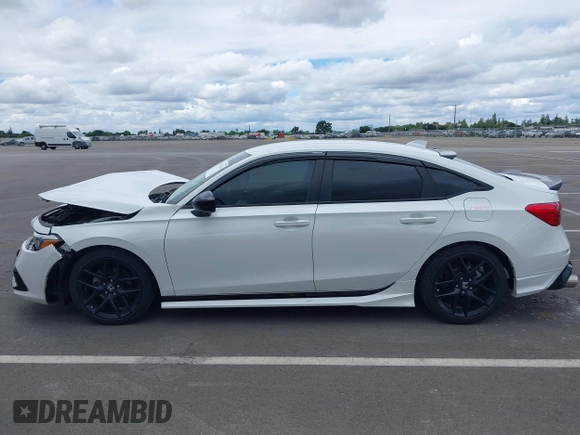 2023 Honda Civic Sport z VIN 2HGFE2F52PH551175, wystawiony jako IAAI lot #42251314 z przebiegiem 23 419 mil mil oraz . Historia ofert i sprzedaży dostępna na DreamBid. Obrazek 14.