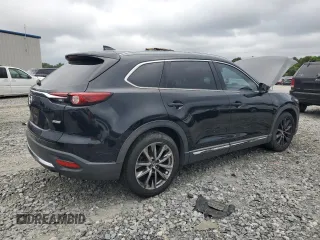 2016 Mazda CX-9 Grand Touring z VIN JM3TCADY7G0122768, wystawiony jako Copart lot #65624615 z przebiegiem 82 388 mil mil oraz Czysty tytuł • Clean title. Historia ofert i sprzedaży dostępna na DreamBid. Obrazek 3.