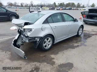 2015 Chevrolet Cruze LT with VIN 1G1PC5SB1F7277783, listed as a IAAI auction lot 41857395 with 127,964 mi miles. Bid and sale history available at carsss.com. Image 4.