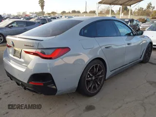 2023 BMW 4 Series M440i with VIN WBA63AW02PFN40551, listed as a IAAI auction lot 41230910 with 23,526 mi miles and . Bid and sale history available at DreamBid. Image 4.