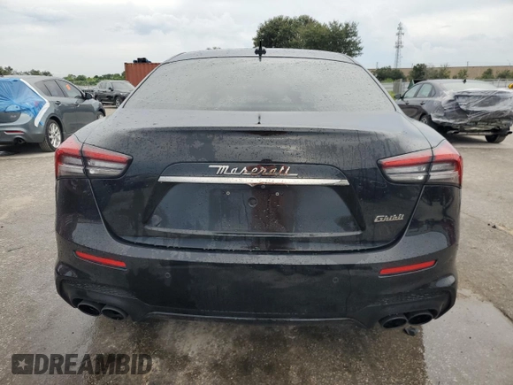 2021 Maserati Ghibli with VIN ZAM57XSS4M1368749, listed as a Copart auction lot 70784004 with 43,930 mi miles and Salvage Title. Bid and sale history available at carsss.com. Image 6.