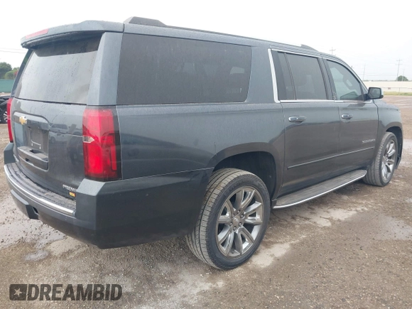 2020 Chevrolet Suburban Premier with VIN 1GNSCJKC8LR290783, listed as a IAAI auction lot 42636126 with 59,371 mi miles and . Bid and sale history available at DreamBid. Image 4.