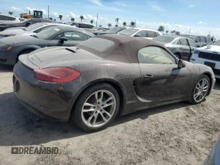 2014 Porsche Boxster z VIN WP0CA2A83ES120462, wystawiony jako Copart lot #74617404 z przebiegiem 23 055 mil mil oraz Nie do naprawy • Non repairable. Historia ofert i sprzedaży dostępna na DreamBid. Obrazek 3.