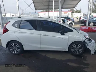 2016 Honda Fit EX with VIN JHMGK5H71GX042913, listed as a IAAI auction lot 42078814 with 94,824 mi miles and . Bid and sale history available at DreamBid. Image 13.