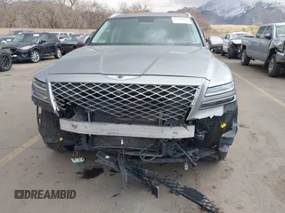 2023 Genesis GV80 with VIN KMUHBDSB2PU113046, listed as a IAAI auction lot 41516832 with 53,897 mi miles and . Bid and sale history available at DreamBid. Image 6.
