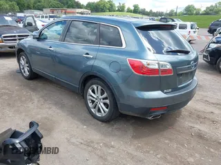 2012 Mazda CX-9 Grand Touring z VIN JM3TB2DA3C0355617, wystawiony jako IAAI lot #42198050 z przebiegiem 185 852 mil mil oraz . Historia ofert i sprzedaży dostępna na DreamBid. Obrazek 3.
