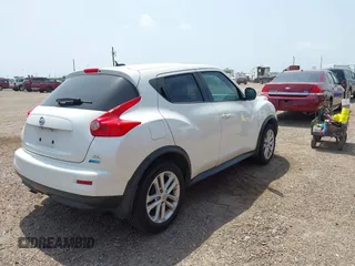 2013 Nissan Juke SV with VIN JN8AF5MR4DT225880, listed as a IAAI auction lot 41932207 with 212,193 mi miles. Bid and sale history available at carsss.com. Image 4.