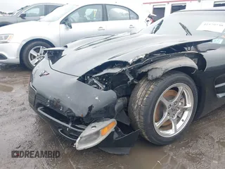 1999 Chevrolet Corvette with VIN 1G1YY22GXX5130973, listed as a IAAI auction lot 41579738 with 63,089 mi miles. Bid and sale history available at carsss.com. Image 6.