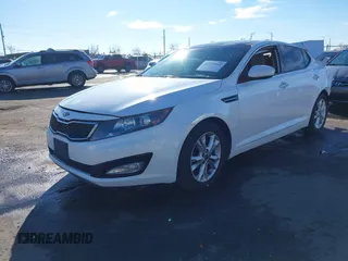 2011 Kia Optima EX with VIN KNAGN4A60B5163017, listed as a IAAI auction lot 41277968 with 185,012 mi miles and . Bid and sale history available at carsss.com. Image 2.