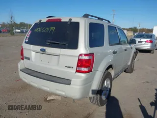2008 Ford Escape XLT with VIN 1FMCU93158KA39754, listed as a IAAI auction lot 40660179 with 113,956 mi miles. Bid and sale history available at carsss.com. Image 4.