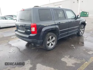 2016 Jeep Patriot Latitude with VIN 1C4NJRFB5GD545467, listed as a IAAI auction lot 41803699 with 172,398 mi miles. Bid and sale history available at carsss.com. Image 4.
