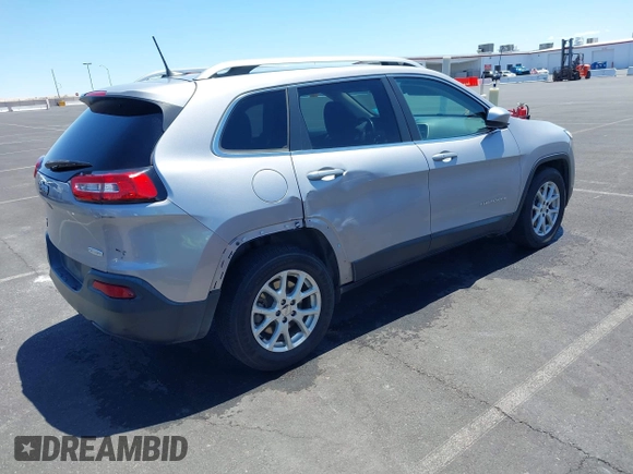2017 Jeep Cherokee Latitude with VIN 1C4PJMCB1HD213964, listed as a IAAI auction lot 42263437 with 105,618 mi miles and . Bid and sale history available at DreamBid. Image 4.