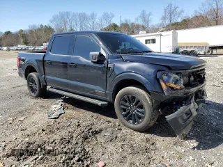 2024 Ford F-150 XLT with VIN 1FTFW3LD5RFB53704, listed as a Copart auction lot 49791305 with 5,972 mi miles and Salvage Title. Bid and sale history available at carsss.com. Image 4.