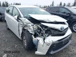 2015 Toyota Prius Two with VIN JTDZN3EU7FJ040438, listed as a IAAI auction lot 41641753 with 57,727 mi miles and . Bid and sale history available at DreamBid. Image 6.